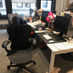 Four unoccupied chairs raise their arms in gratitude for another day at the temperate and stylish Jezebel pod.